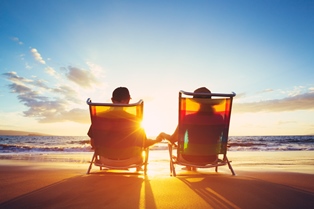 Couple sitting on the beach